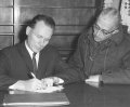 Paul Fye and unidentified man
